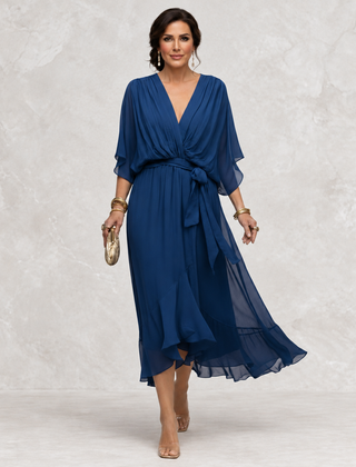 Monica V-Neck Dress blue front view on light studio background
