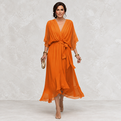Monica V-Neck Dress orange front view on light studio background