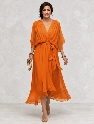 Monica V-Neck Dress orange front view on light studio background
