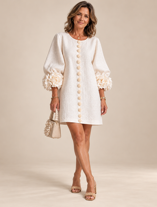 Rosalie Button-Down Mini Dress in White, worn by a mature woman