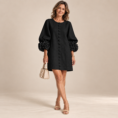 Rosalie Button-Down Mini Dress in Black, worn by a mature woman