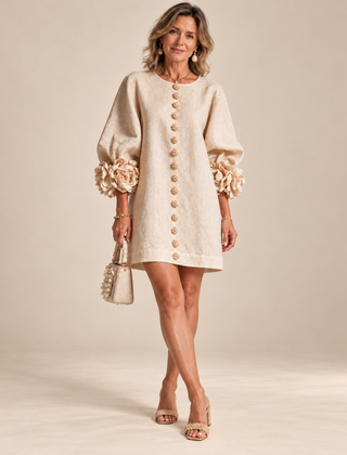 Rosalie Button-Down Mini Dress in Beige, worn by a mature woman