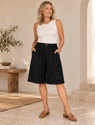 Sabby Everyday Elegant Shorts in Black worn by a woman over 50