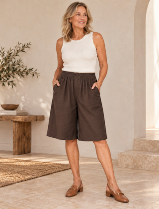 Sabby Everyday Elegant Shorts in Brown worn by a woman over 50