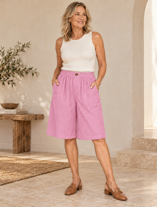 Sabby Everyday Elegant Shorts in Pink worn by a woman over 50