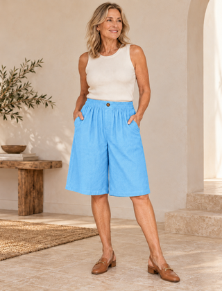 Sabby Everyday Elegant Shorts in Sky Blue worn by a woman over 50