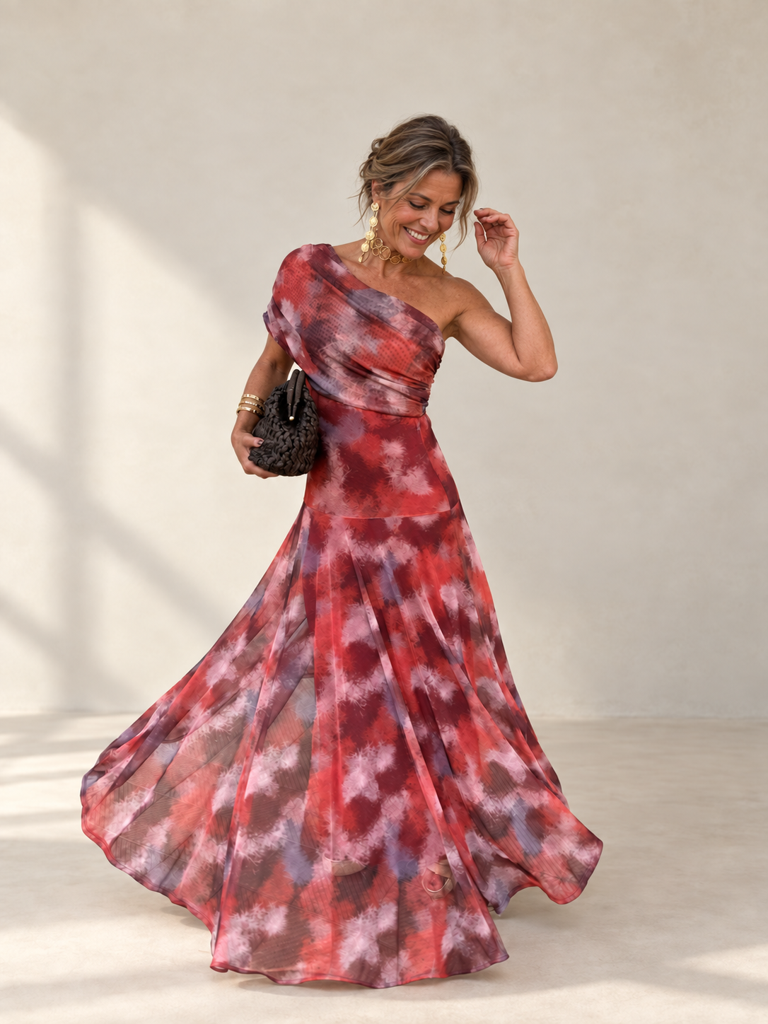Valentina watercolor off-shoulder long dress on a mature woman – flowing skirt