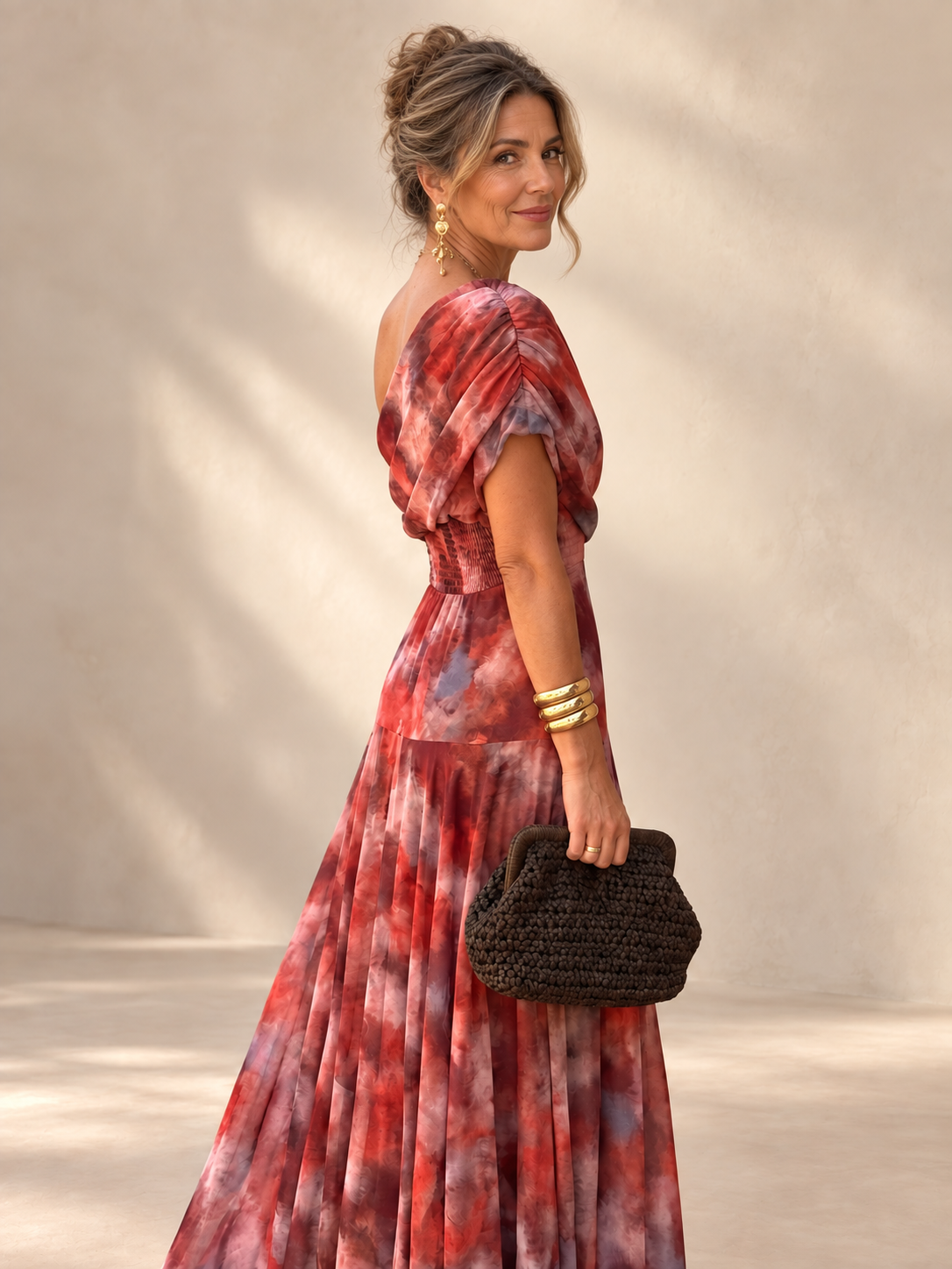 Valentina watercolor off-shoulder long dress on a mature woman – side and back view