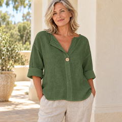 Zamma Relaxed V-Neck Top in green, styled on a mature woman in a light summer setting